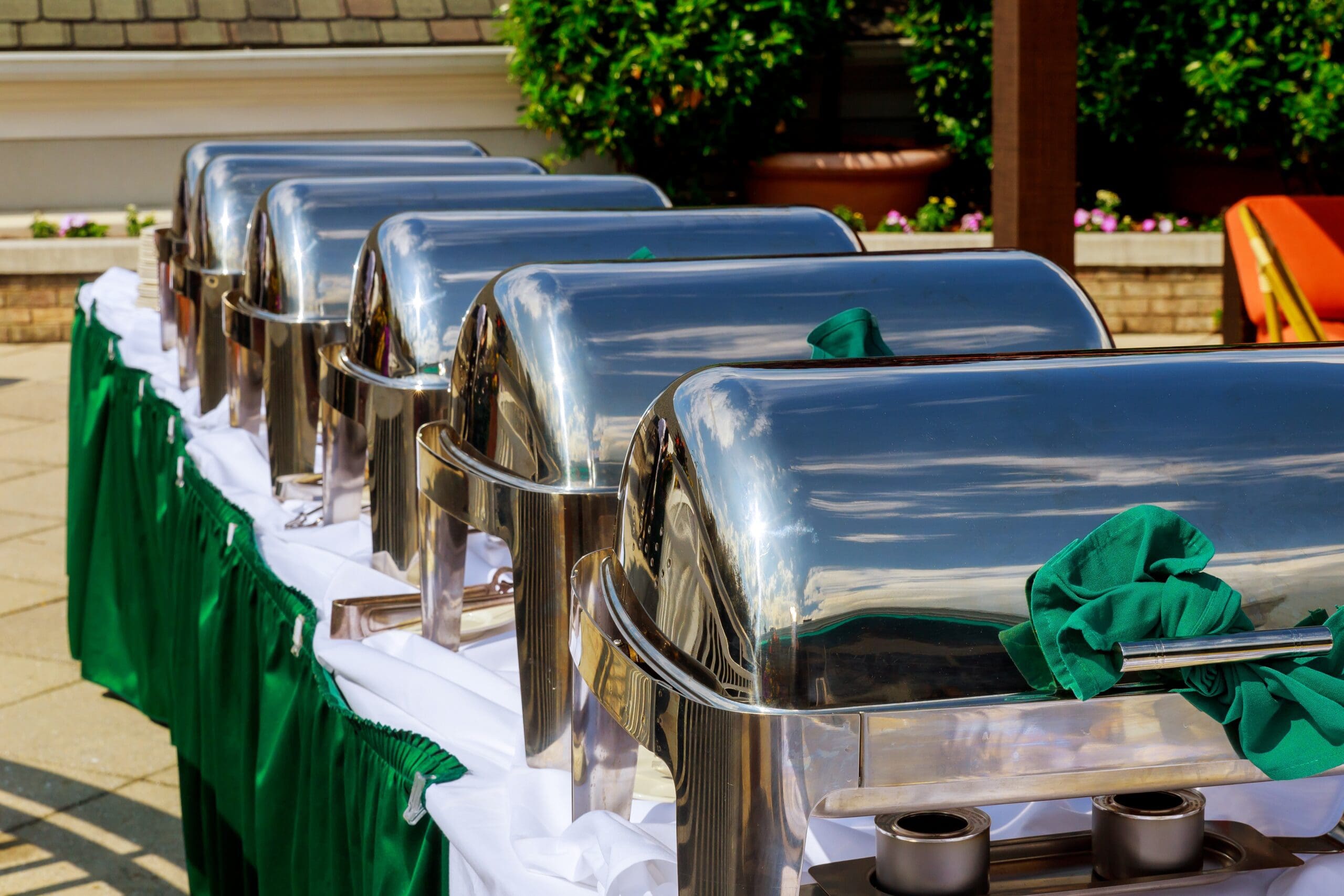 Many buffet heated trays ready for service, warming trays for buffet line